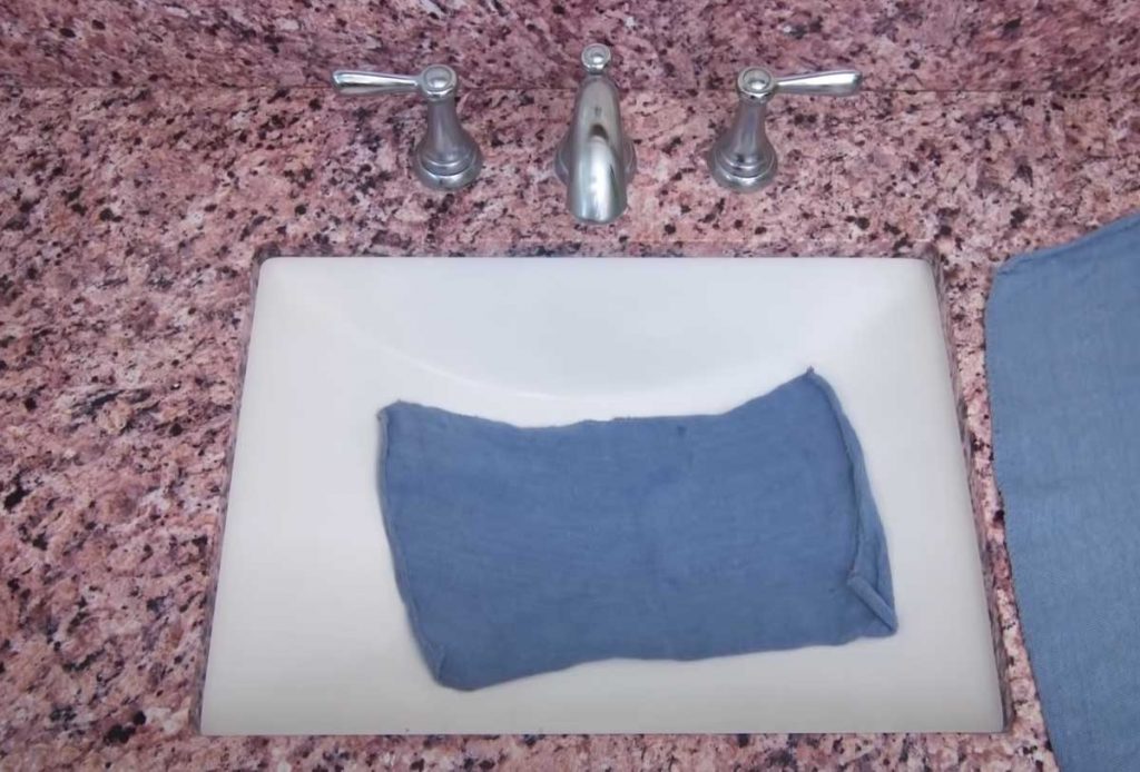 cover the sink with a towel